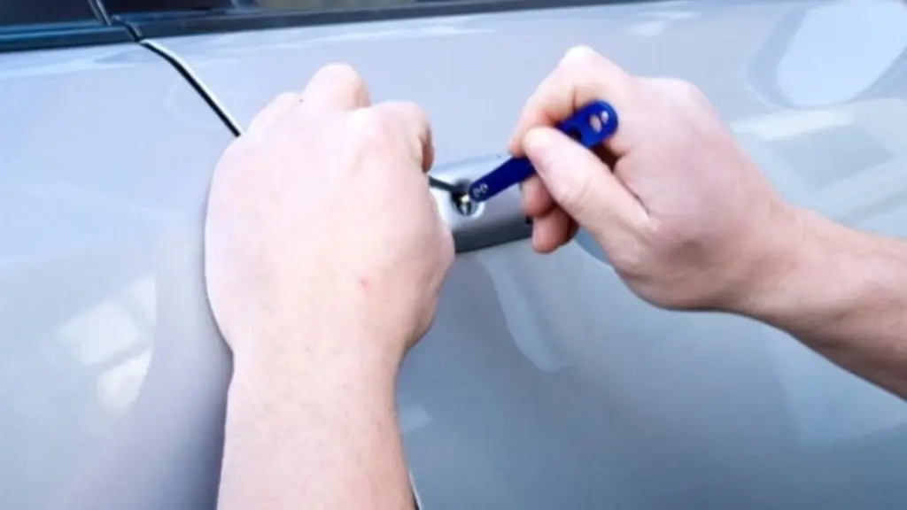 mobile lock technician working on car